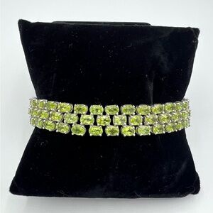 Elegant Green Peridot and Sterling Silver Bracelet. Length 8”. Width 1/2 inch.
